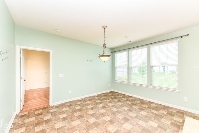 15946 Marsala Dr, Fishers, IN 46037 - spare room featuring stone finish floors and a smoke detector
