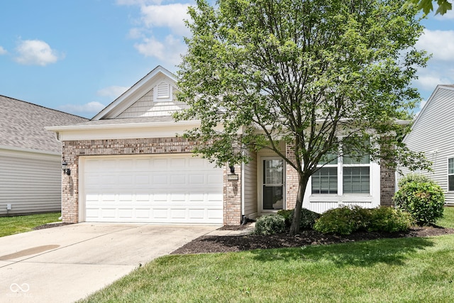 15946 Marsala Dr, Fishers, IN 46037 - view of front of house with brick siding, driveway, an attached garage, and a front lawn