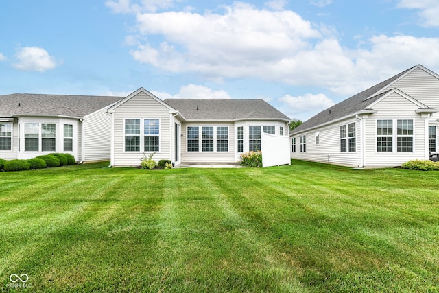 15946 Marsala Dr, Fishers, IN 46037 - rear view of property with a lawn