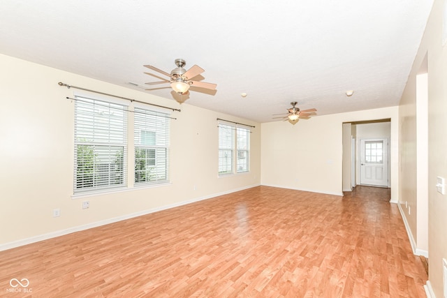 15946 Marsala Dr, Fishers, IN 46037 - empty room featuring ceiling fan and light wood-style flooring