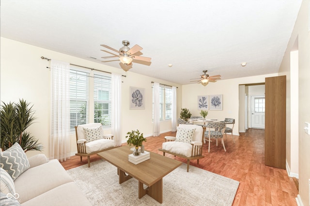 15946 Marsala Dr, Fishers, IN 46037 - living area featuring ceiling fan and light wood-type flooring