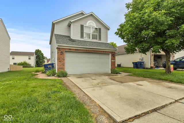 11532 Glenn Abbey Ln, Indianapolis, IN 46235 - traditional home with brick siding, a garage, a front lawn, concrete driveway, and roof with shingles