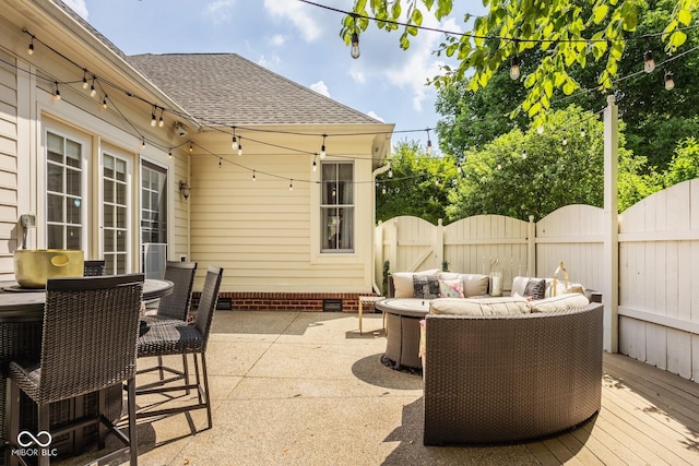 12505 Branford St, Carmel, IN 46032 - view of patio / terrace featuring a gate, an outdoor living space, a deck, and outdoor dining space