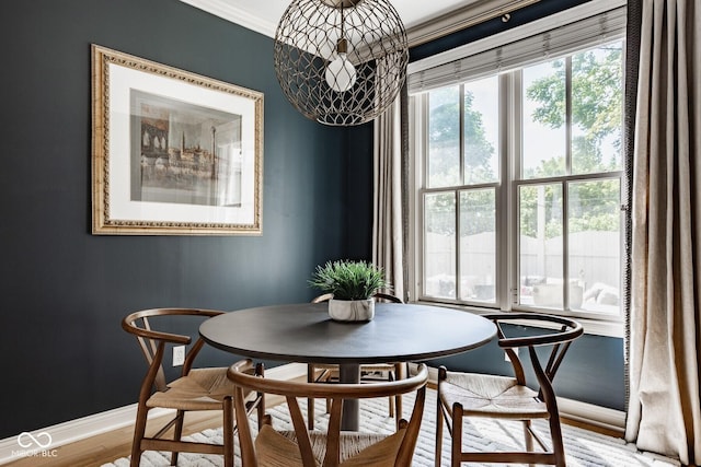 12505 Branford St, Carmel, IN 46032 - dining space with wood finished floors and ornamental molding