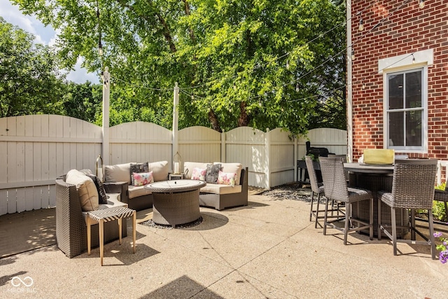 12505 Branford St, Carmel, IN 46032 - fenced backyard with an outdoor hangout area and a patio