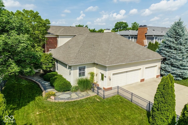 12505 Branford St, Carmel, IN 46032 - view of home's exterior featuring a chimney, roof with shingles, a garage, and concrete driveway