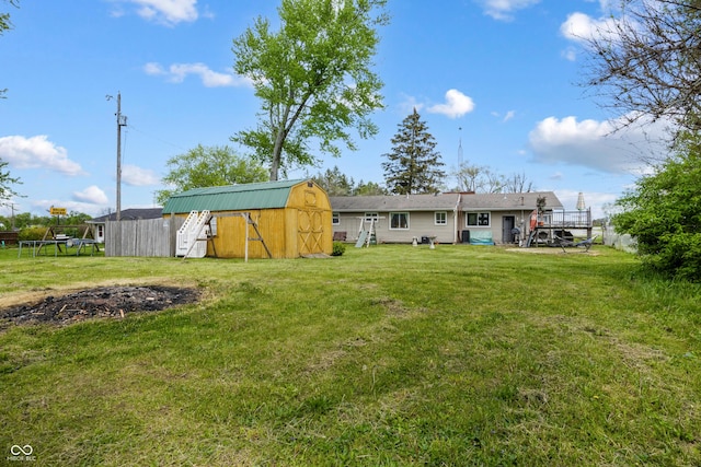 1207 E Main St, Centerville, IN 47330 - back of property with a yard and a storage unit