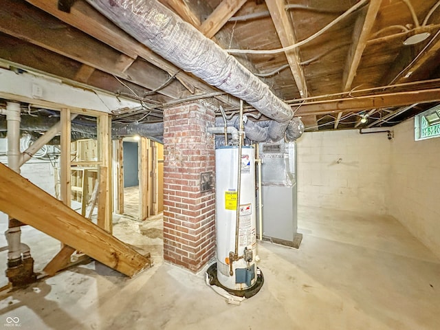 3422 Hillside Ave, Indianapolis, IN 46218 - basement featuring gas water heater and heating unit