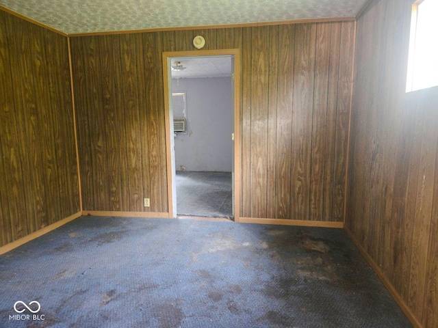 5156 N 14th St, Terre Haute, IN 47805 - carpeted empty room featuring wooden walls and a smoke detector