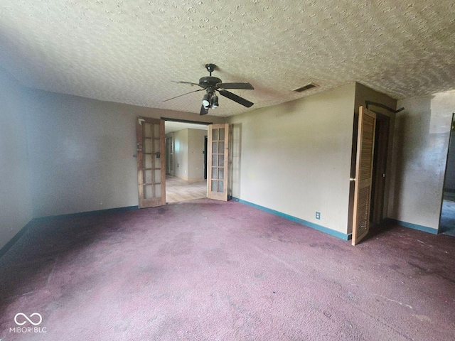 5156 N 14th St, Terre Haute, IN 47805 - carpeted empty room with a ceiling fan and a textured ceiling
