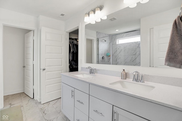 4250 Blackford Rd, Bargersville, IN 46106 - full bathroom with a stall shower, double vanity, a spacious closet, and marble look tile flooring