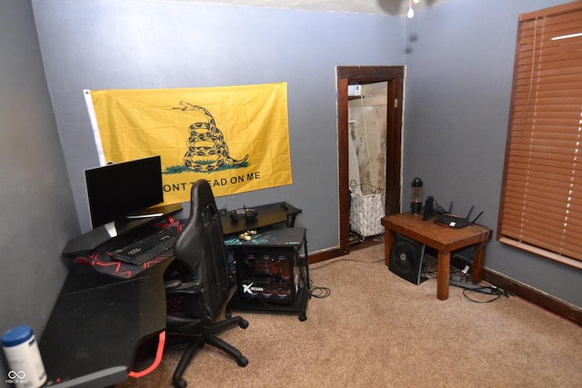 2616 Jackson St, Anderson, IN 46016 - carpeted home office featuring baseboards and a ceiling fan
