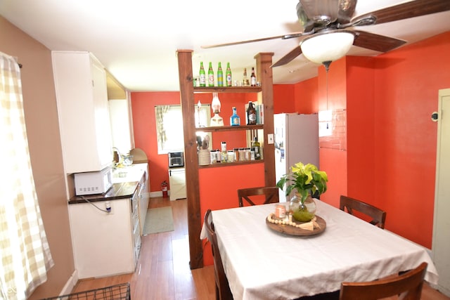 2616 Jackson St, Anderson, IN 46016 - dining room featuring light wood finished floors and a ceiling fan