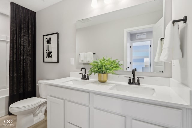 6842 Jacone Dr, Brownsburg, IN 46112 - bathroom featuring double vanity and shower / tub combo with curtain