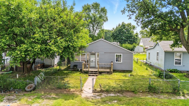 3251 Mars Hill St, Indianapolis, IN 46221 - rear view of property with a wooden deck, a gate, and a fenced backyard