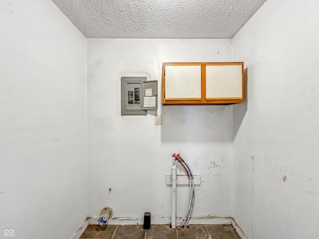 3251 Mars Hill St, Indianapolis, IN 46221 - laundry area with electric panel and a textured ceiling