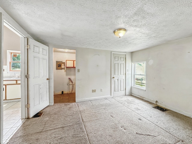 3251 Mars Hill St, Indianapolis, IN 46221 - unfurnished bedroom featuring a sink and a textured ceiling