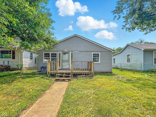 3251 Mars Hill St, Indianapolis, IN 46221 - rear view of house with a wooden deck and a fenced backyard