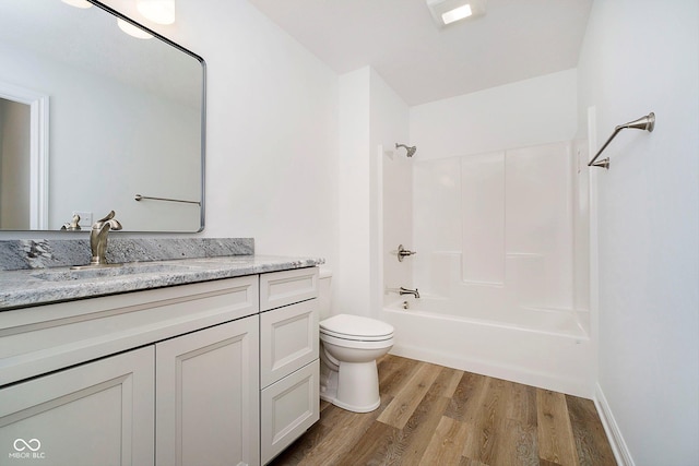 202 Asbury Dr, Anderson, IN 46013 - full bathroom with wood finished floors, vanity, and shower / tub combination