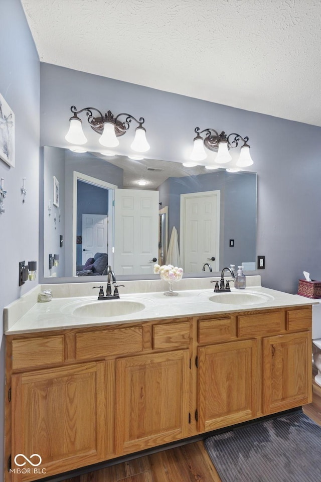 1896 Central Park Blvd W, Greenwood, IN 46143 - full bath featuring double vanity, wood finished floors, and connected bathroom