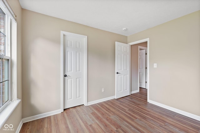 1896 Central Park Blvd W, Greenwood, IN 46143 - unfurnished bedroom featuring light wood-style flooring and baseboards
