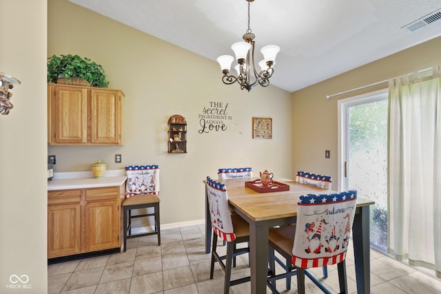 1896 Central Park Blvd W, Greenwood, IN 46143 - dining space with lofted ceiling, a chandelier, and light tile patterned floors