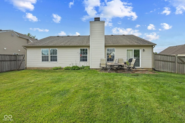 1896 Central Park Blvd W, Greenwood, IN 46143 - rear view of house featuring a fenced backyard, a chimney, a patio, and roof with shingles