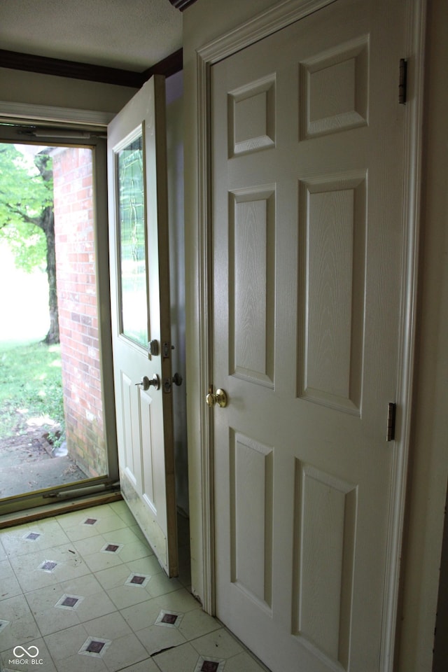 515 Hawthorne Ave, Anderson, IN 46011 - doorway with light tile patterned floors