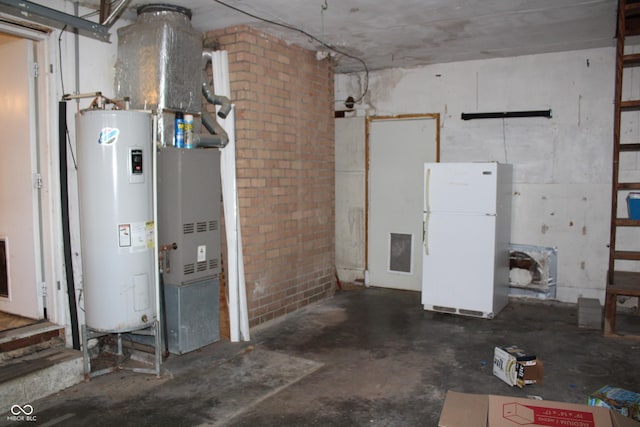 515 Hawthorne Ave, Anderson, IN 46011 - basement featuring freestanding refrigerator, water heater, and heating unit