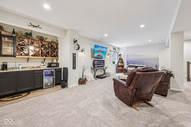 19281 Scofield Ridge Blvd, Westfield, IN 46074 - living area with bar with sink, wine cooler, light carpet, and recessed lighting
