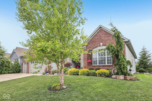 19281 Scofield Ridge Blvd, Westfield, IN 46074 - view of property hidden behind natural elements with brick siding, concrete driveway, a front yard, and a garage