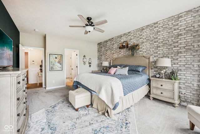 19281 Scofield Ridge Blvd, Westfield, IN 46074 - bedroom featuring light colored carpet, brick wall, ensuite bath, and a ceiling fan
