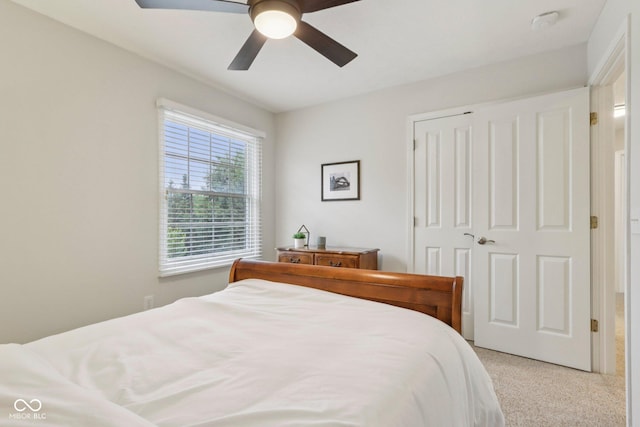 427 Quincy Pl, Westfield, IN 46074 - bedroom featuring light colored carpet, a closet, and ceiling fan