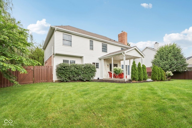 427 Quincy Pl, Westfield, IN 46074 - back of property featuring a gate and a chimney