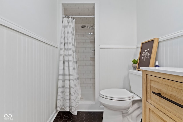 3841 Meridee Dr, Indianapolis, IN 46237 - full bathroom featuring a wainscoted wall, a tile shower, and vanity
