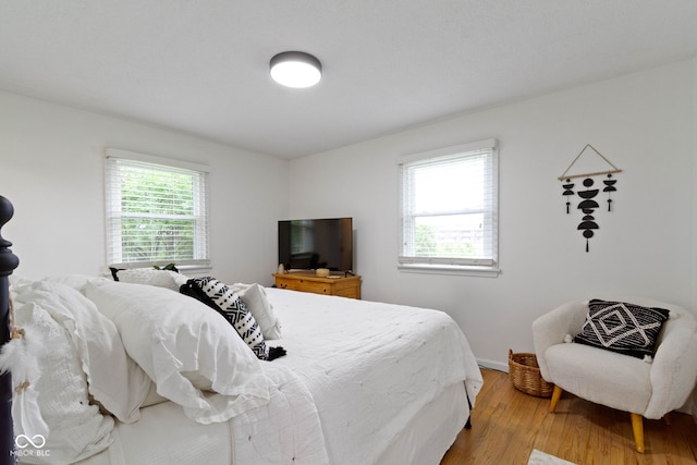 3841 Meridee Dr, Indianapolis, IN 46237 - bedroom featuring light wood finished floors and baseboards