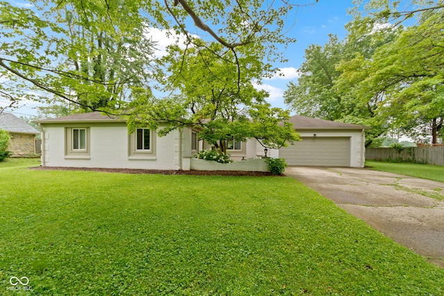 3841 Meridee Dr, Indianapolis, IN 46237 - view of front facade with concrete driveway, an attached garage, and brick siding