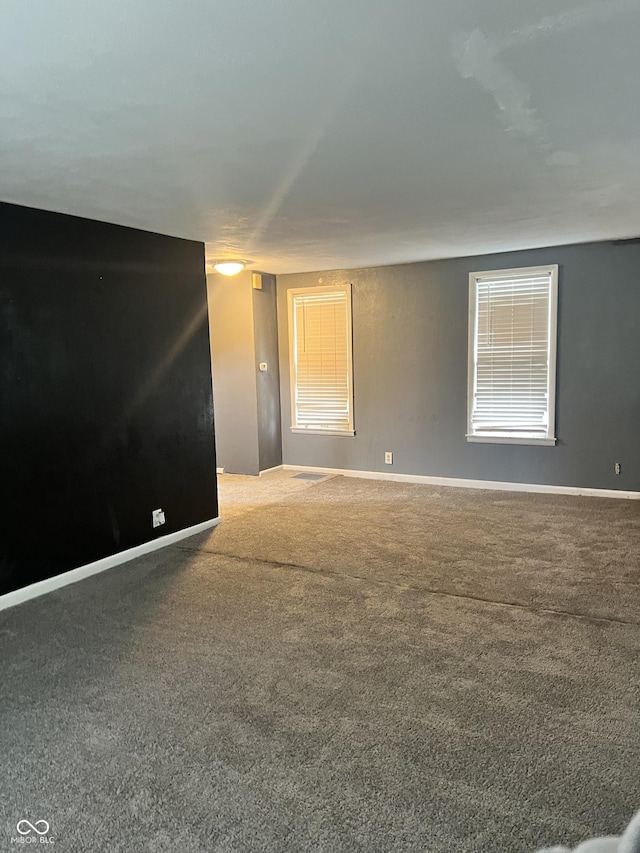 2244 Lafayette St, Anderson, IN 46012 - carpeted empty room with baseboards