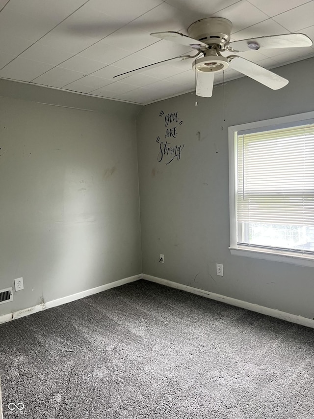 2244 Lafayette St, Anderson, IN 46012 - empty room with carpet floors and a ceiling fan