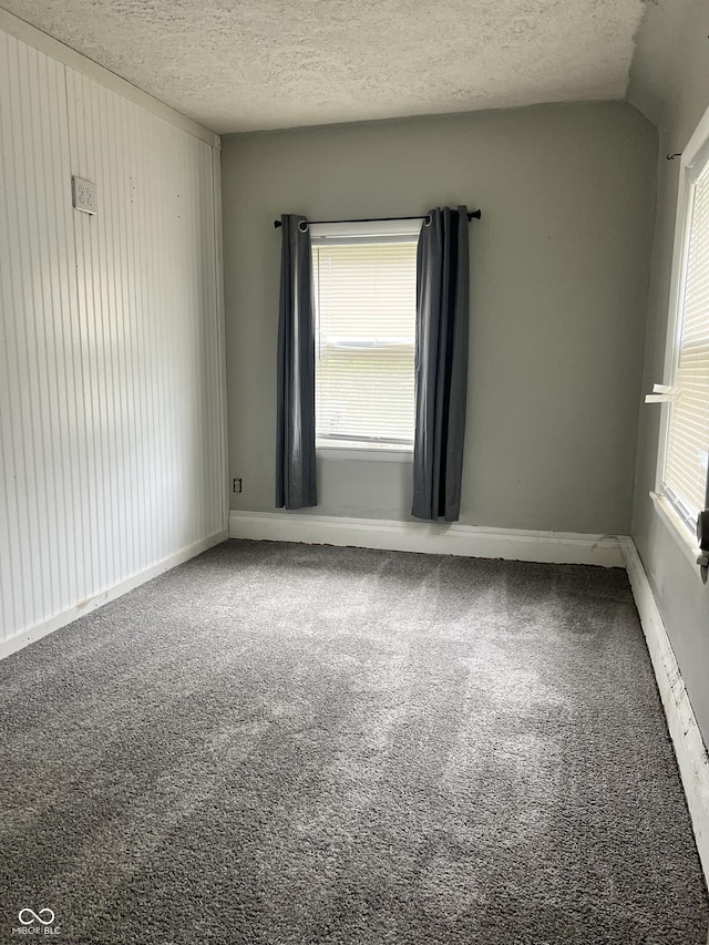 2244 Lafayette St, Anderson, IN 46012 - carpeted spare room with a textured ceiling