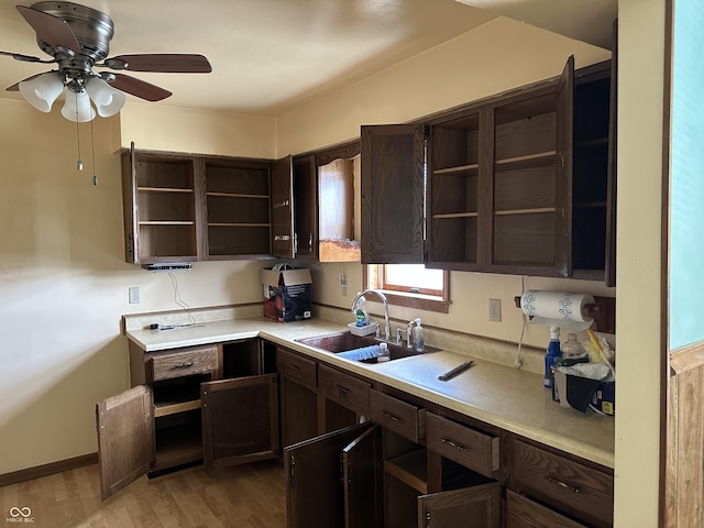4673 S 400 W, New Palestine, IN 46163 - kitchen with open shelves, dark brown cabinets, light countertops, and light wood-style flooring