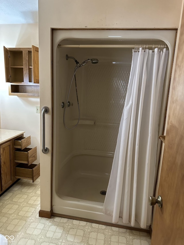 4673 S 400 W, New Palestine, IN 46163 - bathroom featuring a shower with shower curtain, tile patterned floors, and vanity