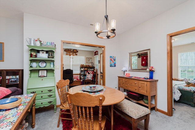 5515 Gateridge Ln, Indianapolis, IN 46237 - carpeted dining area featuring a chandelier