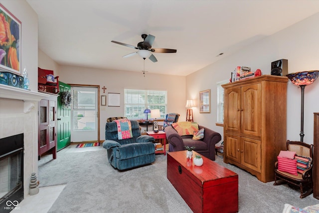 5515 Gateridge Ln, Indianapolis, IN 46237 - living area with light colored carpet, ceiling fan, and a tile fireplace