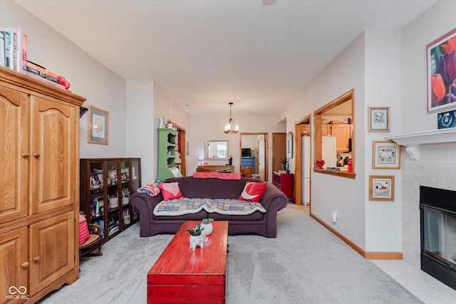 5515 Gateridge Ln, Indianapolis, IN 46237 - living area featuring light carpet, a tiled fireplace, and a chandelier