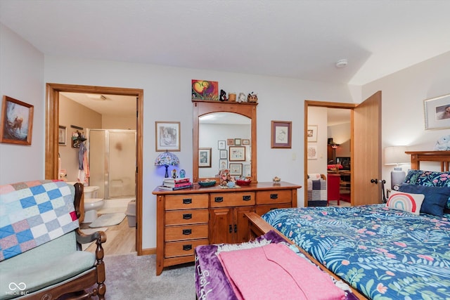 5515 Gateridge Ln, Indianapolis, IN 46237 - bedroom with light colored carpet and connected bathroom