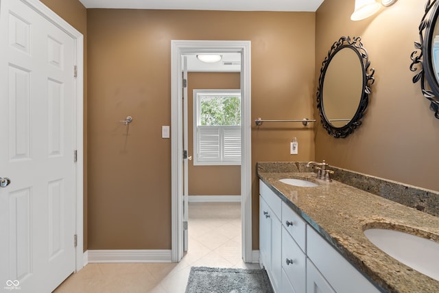 4443 Mallard Pt, Columbus, IN 47201 - full bathroom featuring double vanity and tile patterned flooring
