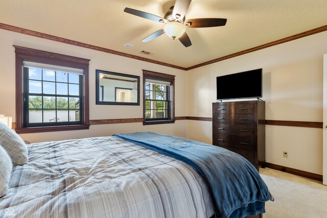 4443 Mallard Pt, Columbus, IN 47201 - bedroom featuring light colored carpet, ornamental molding, and a ceiling fan