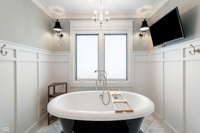 4443 Mallard Pt, Columbus, IN 47201 - bathroom featuring marble look tiles, a decorative wall, a freestanding bath, wainscoting, and ornamental molding