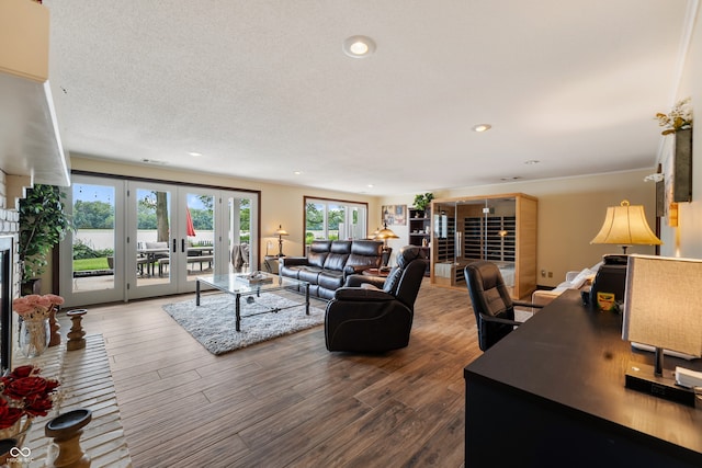 4443 Mallard Pt, Columbus, IN 47201 - living area featuring wood finished floors, french doors, and recessed lighting